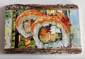 Sushi and Stripes on Wood Slab